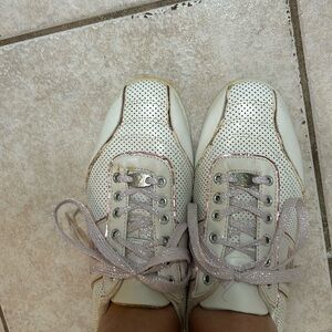 White and metallic pink Rhinestones Baby Phat sneakers.